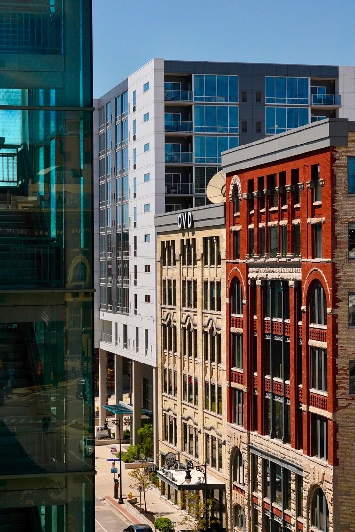 Brick and glass buildings along a downtown Grand Rapids street